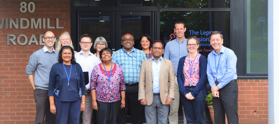 The staff of the International Office outside their office in Brentford
