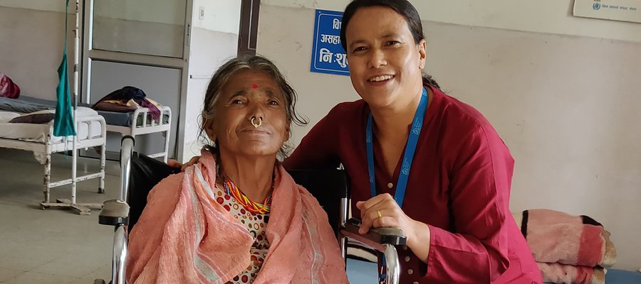 Phulti was sent to live in a cave by her family, but now she receives care at TLM's Anandaban Hospital. Here she poses for a photo with Ruth, from the TLM staff.