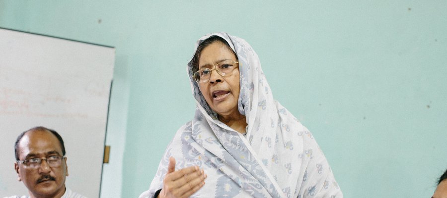 Momataze speaks at a meeting. She is the Founder of Mukti (Organisation working for women’s rights and care, based in Kushtia).