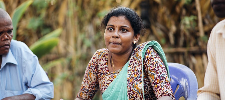 A woman speaks at a local forum in Sri Lanka