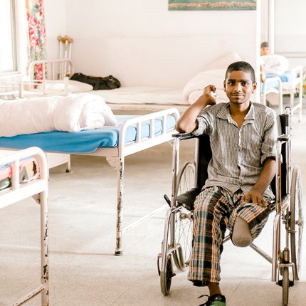 Mahendra sits in a wheelchair in Anandaban Hospital