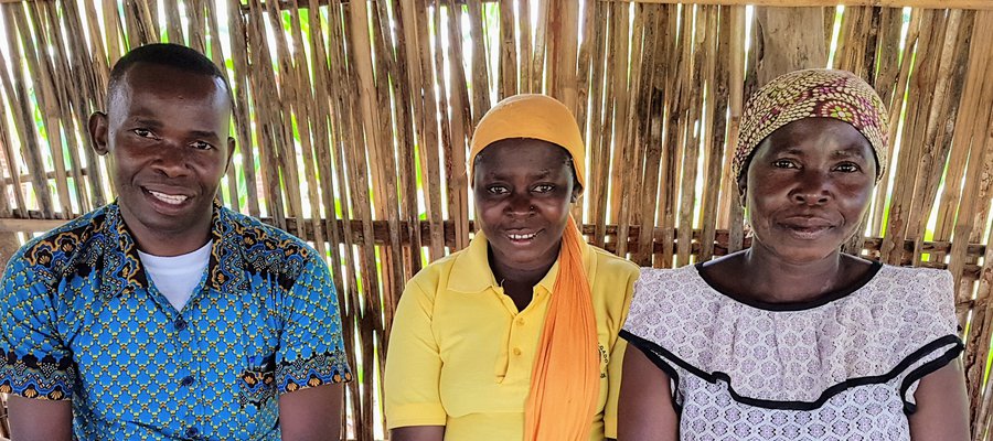 Filomena, with Village Volunteer Tasiana ,and District Supervisor, Martin in Mozambique