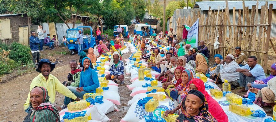 A group of people from Ethiopia smiling at the camera.