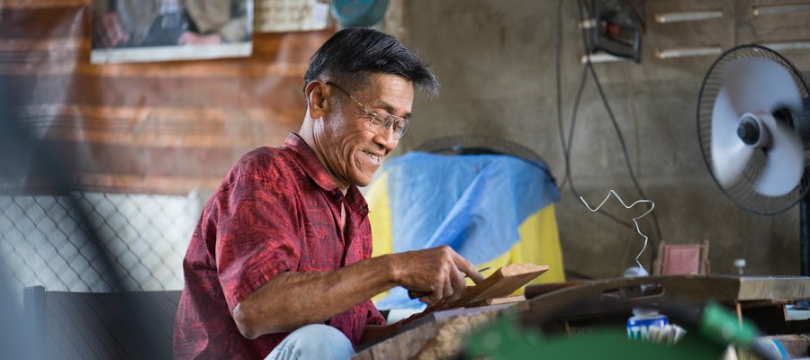 Patana does woodwork in his workshop