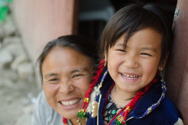 Mother and daughter in Nepal smile at the camera