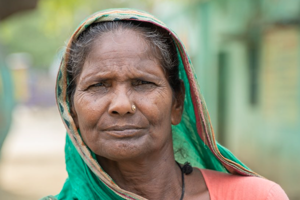 A woman looking into the camera.