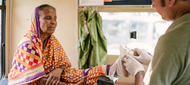 Sarita receives care in one of our mobile clinics
